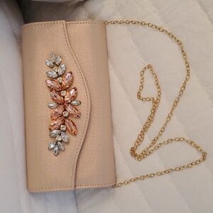 Rose gold evening bag with shimmer. Gold removable chain